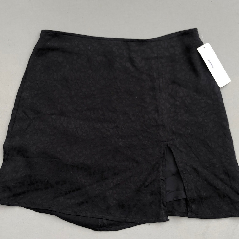 Never worn black skirt with slit.